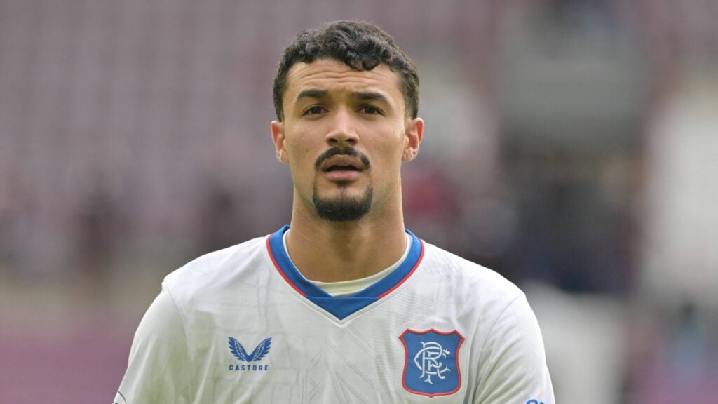 Rangers defender Jefte in action in the away strip