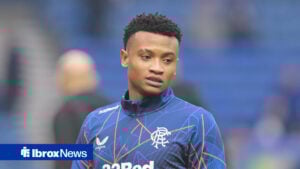 Rangers attacker Oscar Cortes looks on.