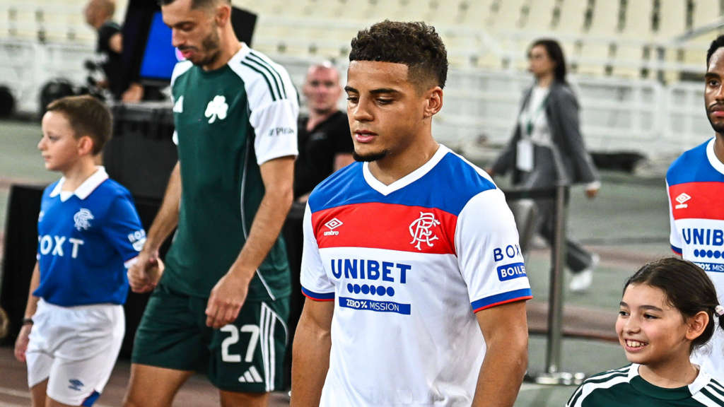 Rangers defender Max Aarons walking out against Panathinaikos.