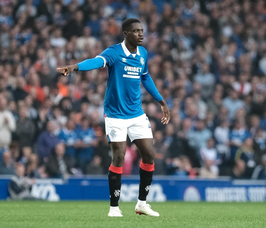 Nasser Djiga pointing whilst playing for Rangers