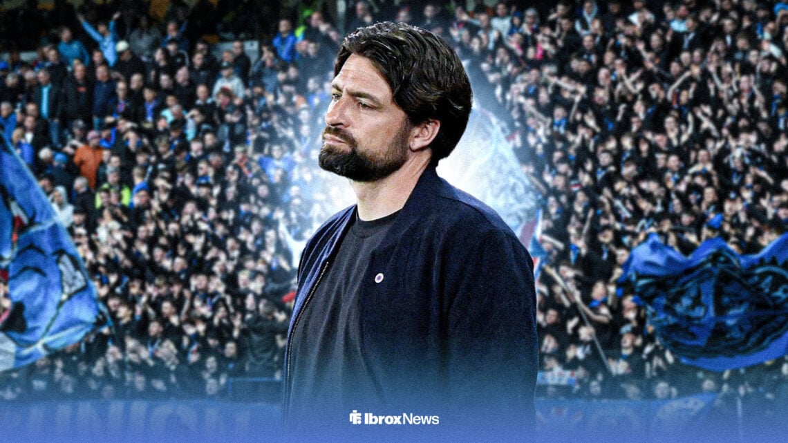 Russell Martin looking dejected, with Ibrox in background