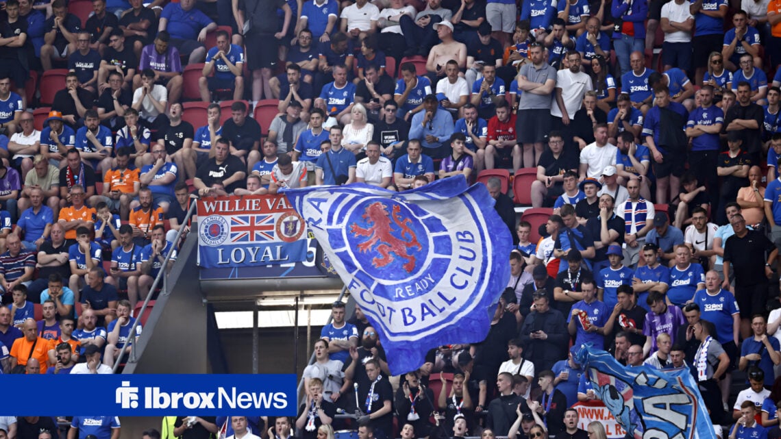 Rangers fans cheer their side on.