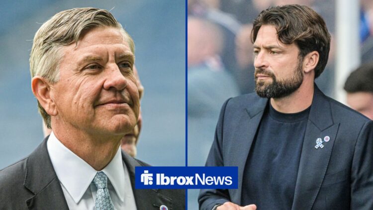 Andrew Cavenagh grinning, with Russell Martin alongside him