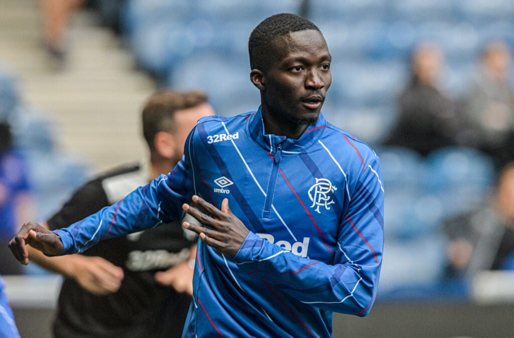 Rangers midfielder Mohamed Diomande warming up
