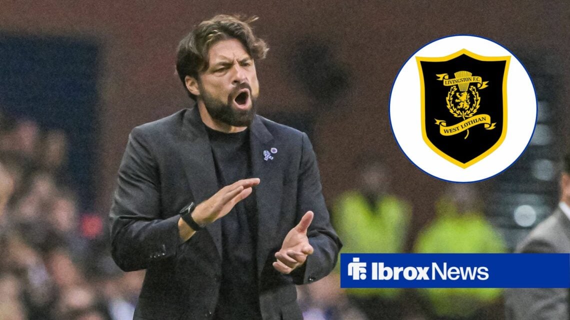 Rangers manager Russell Martin applauds frustratedly in the direction of the Livingston badge, which features in a circular inset.