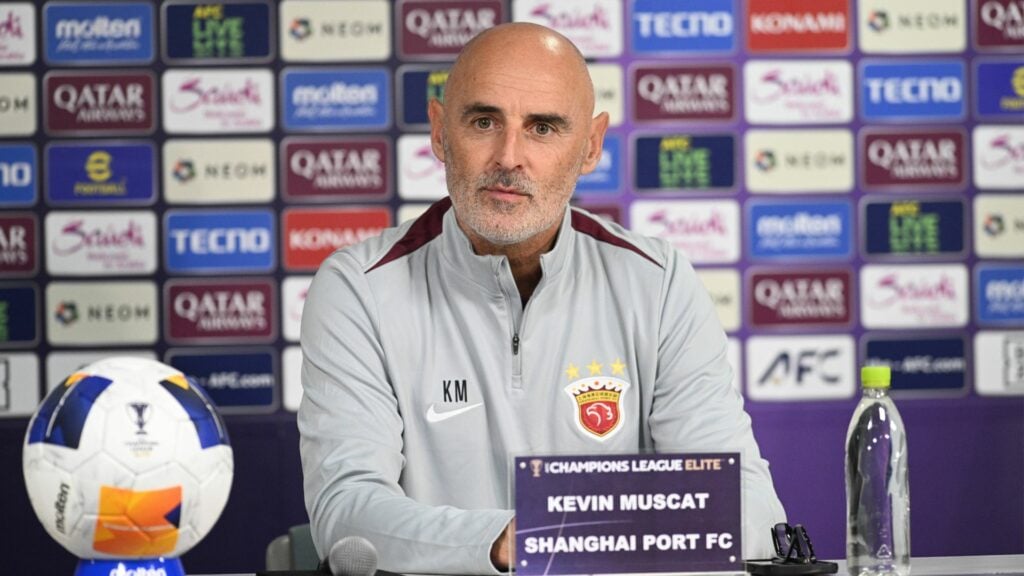 Rangers-linked manager Kevin Muscat stares into the distance during a Shanghai Port press conference.