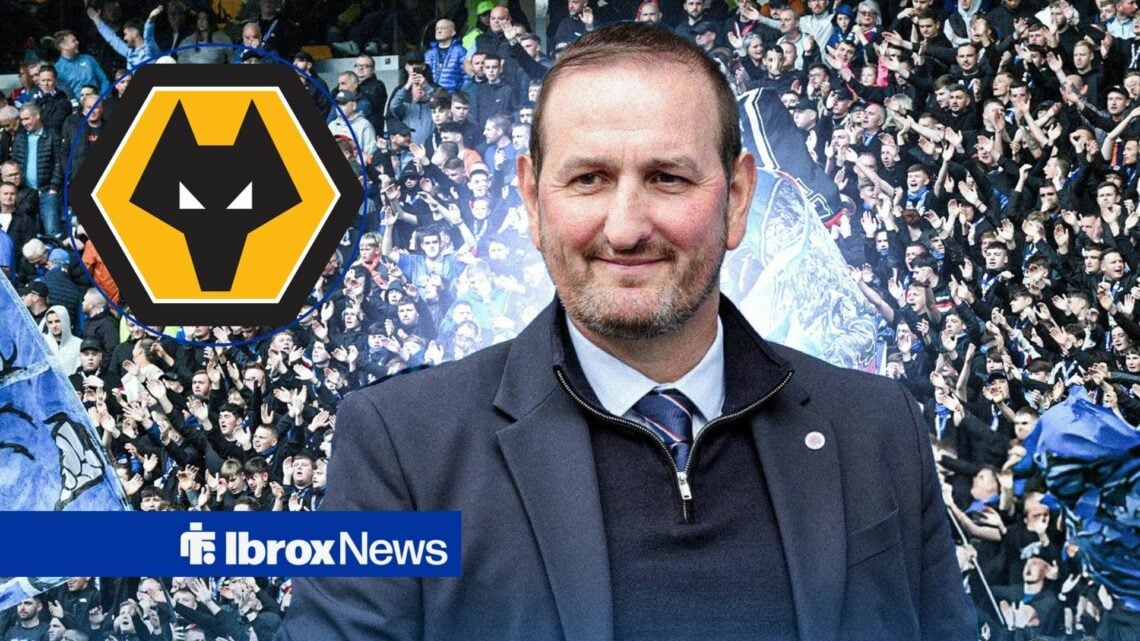 Robbie Thelwell in a suit, with a Wolves badge in a circular frame inset