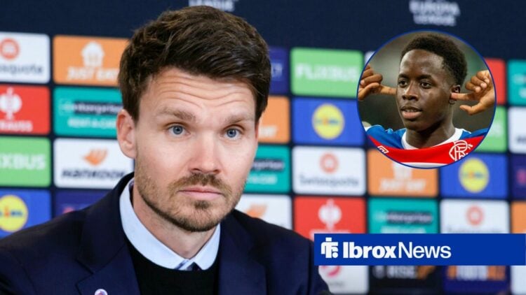 Danny Rohl looking on with Djeidi Gassama in frame