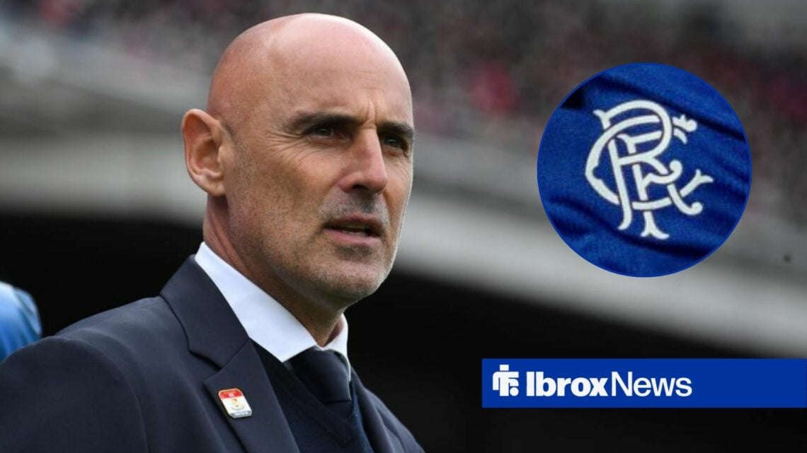 Kevin Muscat looking at Rangers badge