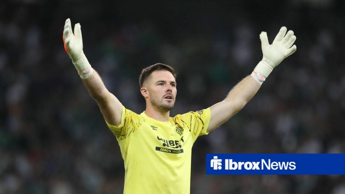 Jack Butland with his arms raised.