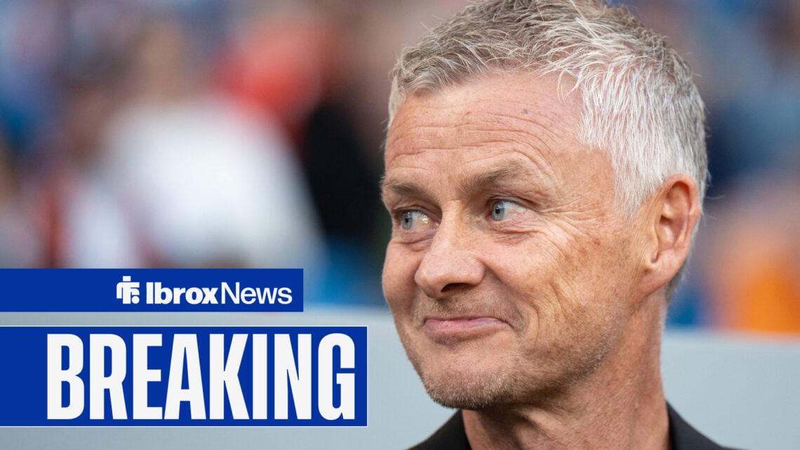 Ole Gunnar Solskjaer smiling to the left with Rangers breaking news logo