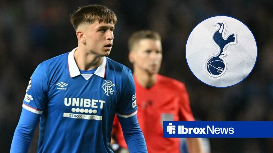 Rangers winger Mikey Moore stares towards the Tottenham badge, which features in a circular inset.