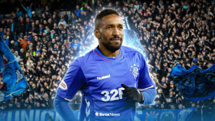 Jermain Defoe smiling in Rangers kit