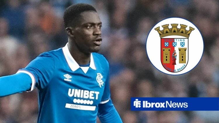 Nasser Djiga looking at the Braga badge.