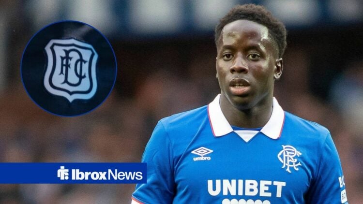 Djeidi Gassama looking at Dundee badge in circle