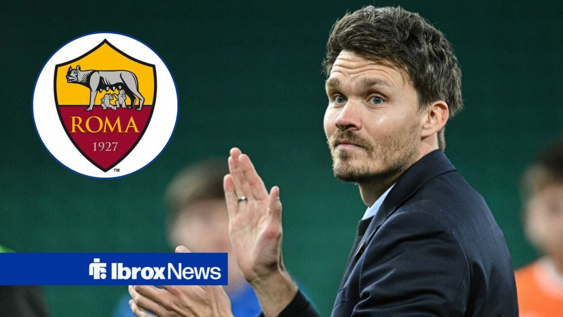 Rangers manager Danny Rohl applauds in the direction of the Roma badge, which features in a circular inset.