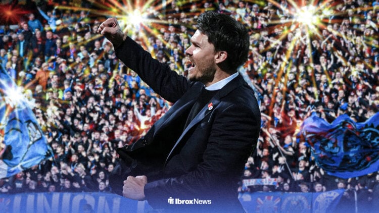 Danny Rohl celebrates at Ibrox, with fireworks going off around him