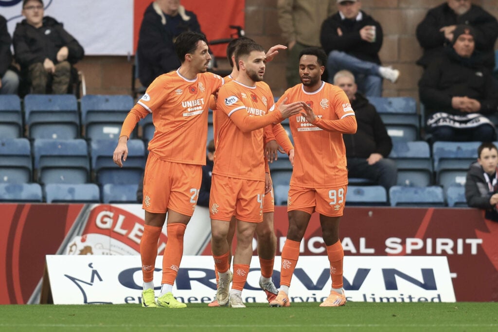 Rangers players celebrate as first goal goes in against Dundee