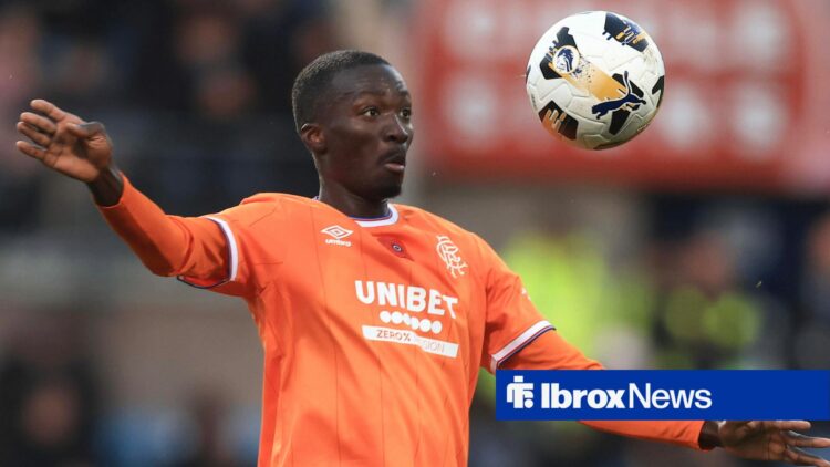 Rangers midfielder Mohamed Diomande in orange away kit