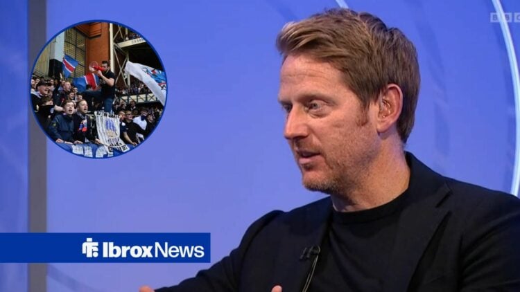 Michael Stewart looking at Rangers fans who are celebrating.