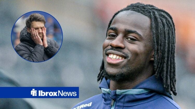 Clinton Nsiala smiling with Danny Rohl in frame