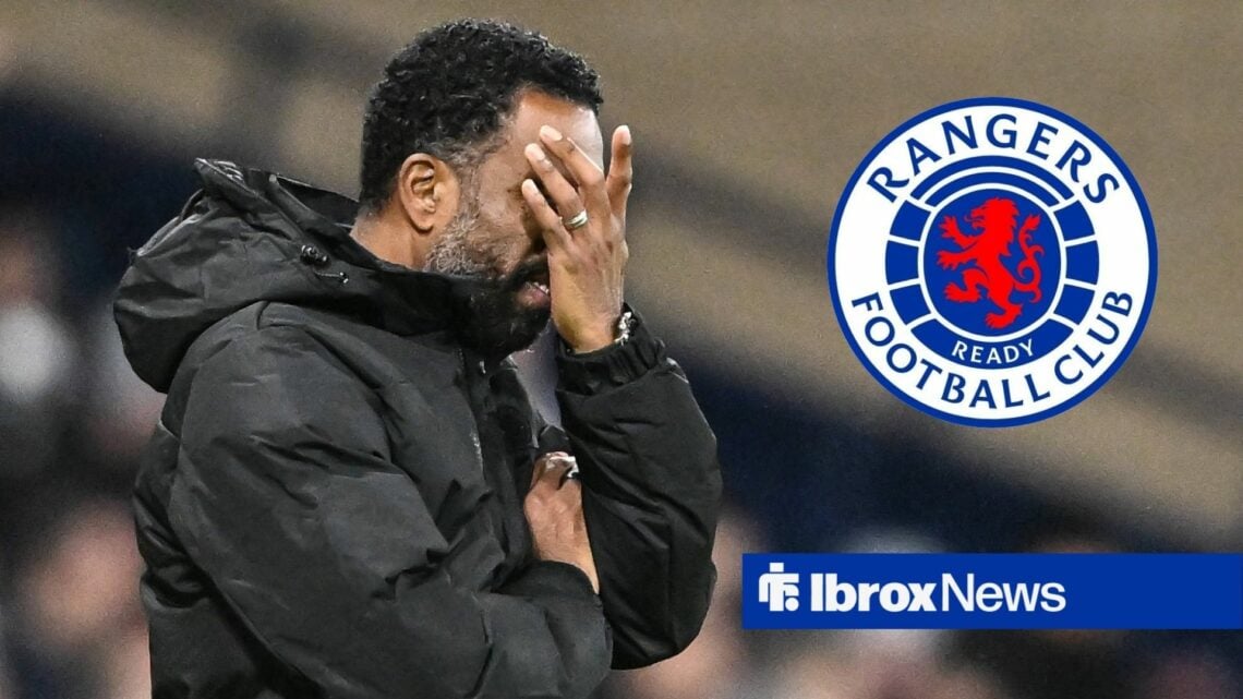 Wilfried Nancy covering his face in the direction of the Rangers badge.