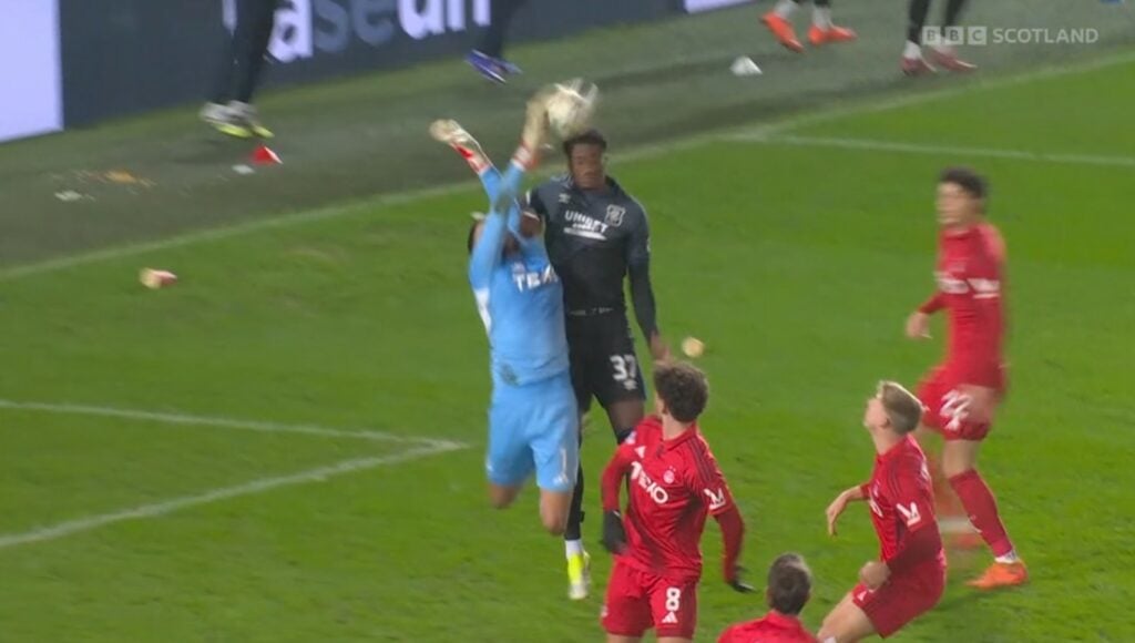 Fernandez jumping against Aberdeen.