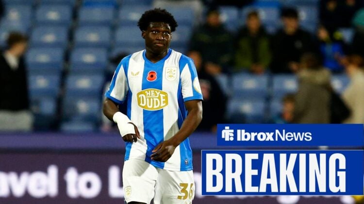 Cameron Ashia in a Huddersfield shirt