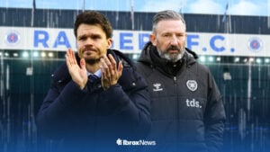 Rangers manager Danny Rohl and Derik McInnes standing infront of a rainy Ibrox