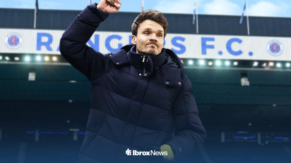 Danny Rohl with his fist in the air celebrating at Ibrox.