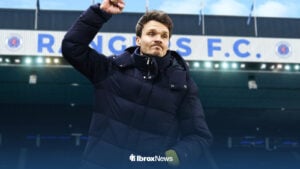Rangers manager Danny Rohl with his fist in the air celebrating at Ibrox.