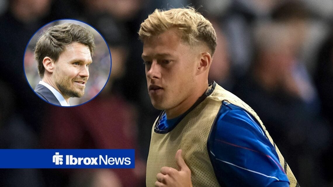 Danny Rohl in circular looking towards Connor Barron as he warms up for Rangers