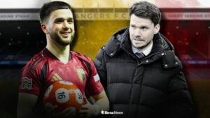 Nico Raskin playing for Belgium looking towards Danny Rohl looking annoyed