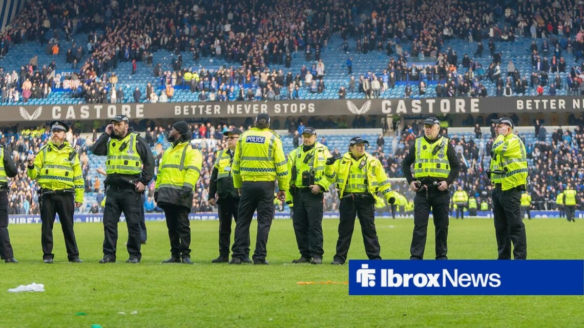 Police try to control supporters at the end of Rangers vs Celtic