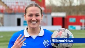 Katie Wilkinson holds up three fingers after her Rangers hat-trick