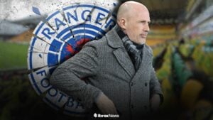 Philippe Clement managing Norwich City at Carrow Road next to the Rangers badge