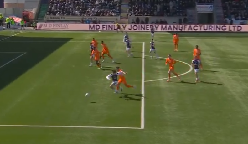 A screenshot of James Tavernier giving away a penalty after pulling back Filip Lissah