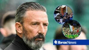 Hearts manager Derek McInnes looking at Rangers and Celtic fans who are both inside of Ibrox.