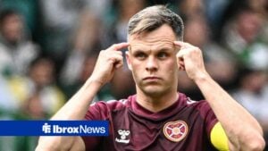 Lawrence Shankland of Heart of Midlothian urges teammates to concentrate and keep calm after scoring during the William Hill Premiership match at Celtic Park, Glasgow