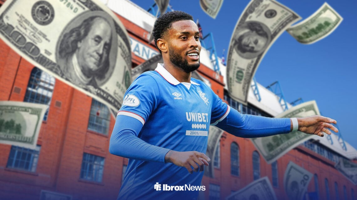 Youssef Chermiti smiling in front of Rangers' stadium, Ibrox, with cash notes falling behind him.