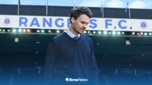Rangers manager Danny Rohl with Ibrox behind him
