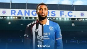 Youssef Chermiti in a half Rangers, half Besiktas shirt.